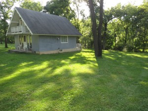 Wapello home on 5 acre side view of home